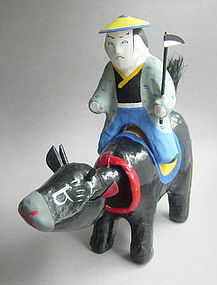 Miharu Hariko Papier-mache Doll, Farmer Riding Cow