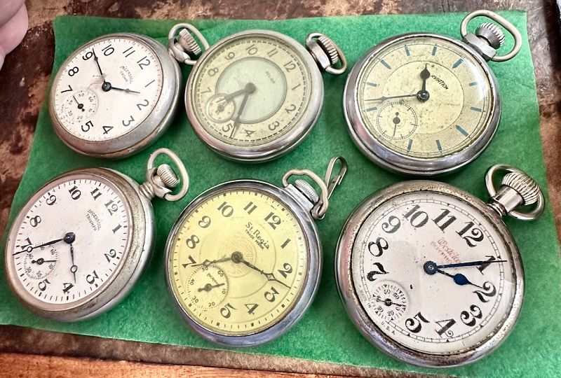 $ DOLLAR POCKET WATCH COLLECTION OF 6 as is complete