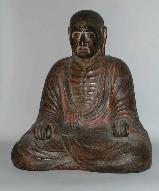 Polychrome wooden sculpture of sitting priest, Japan