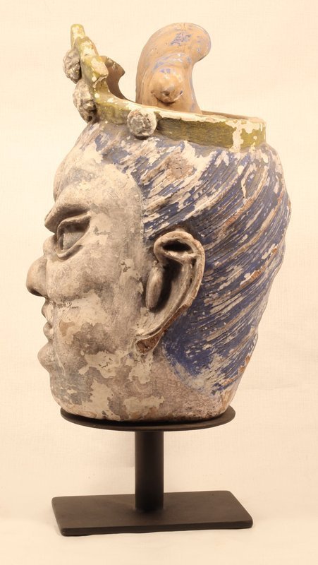 Sung Yuan Dynasty stucco Lokapala head blue