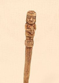 Pre Columbian Moche carved bone figural pin with strombus trumpet