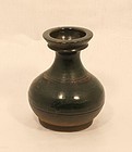 Chinese Han Dynasty Hu form vase in green glaze