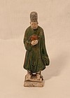 Chinese Ming Dynasty green glazed burial figure of an attendant
