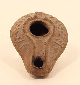 Roman terracotta oil lamp