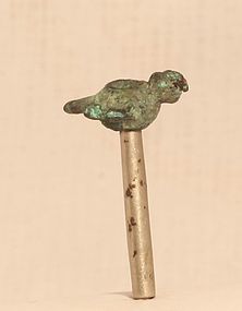 Pre Columbian Moche Chimu Copper cast bird bead on a silver Tube