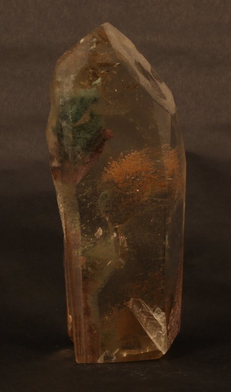 Tall Quartz point with various inclusions