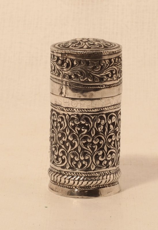 Silver Carved and chased silver herb container with floral designs