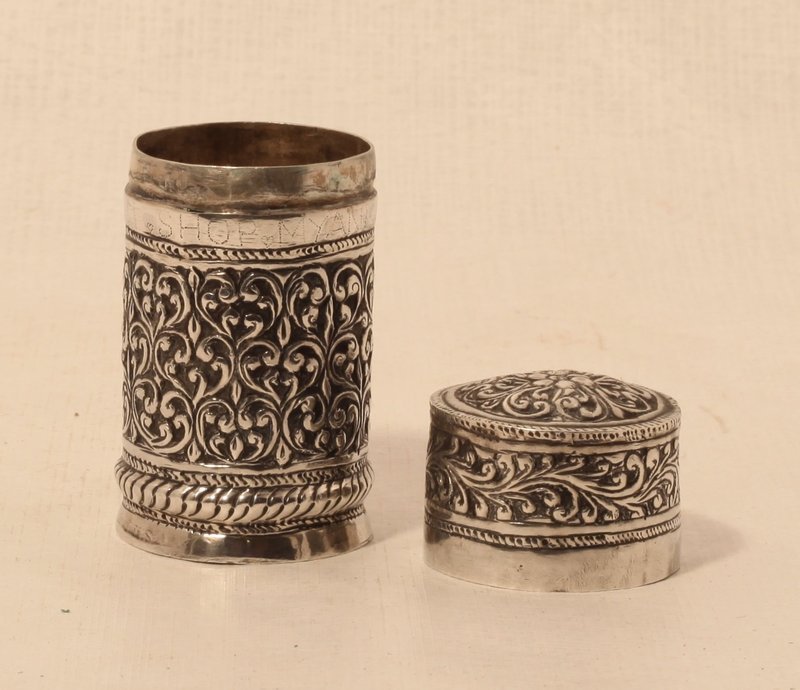 Silver Carved and chased silver herb container with floral designs