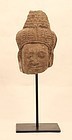 Khmer carved stone head fragment of a male Deity