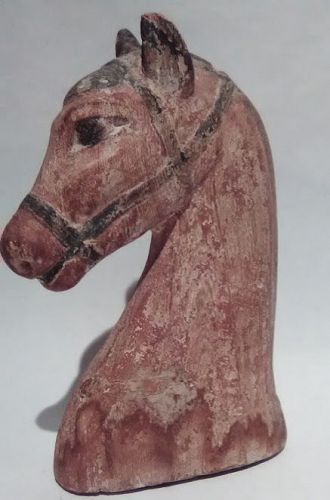 An Egyptian Gesso and wood Painted Horse Head