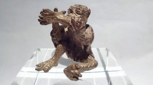 Sterling Edmund Lanier Cryptozoology figure Ape eating Human foot