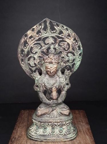 Antique Tibetan Bronze seated Buddha