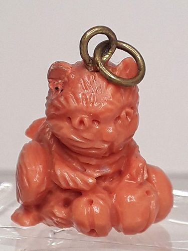 Vintage Japanese Momo Coral carved cat with bells pendant figure
