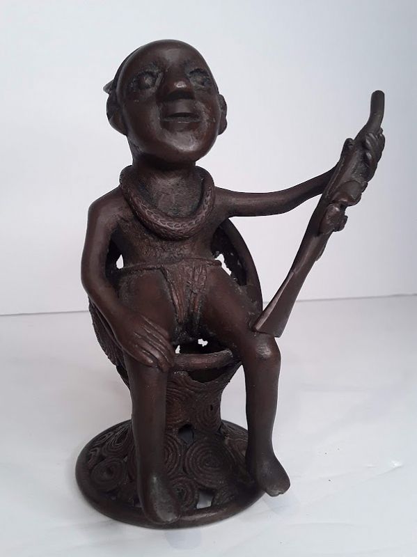 Kongo peoples, Yombe group Copper Bronze seated Oba with Rifle