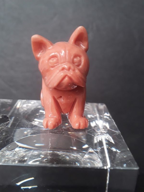 Fine Japanese Momo Coral carving of a seated Pug or Bulldog