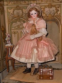 Outstanding French Bisque Poupee with rare Wooden and Kid Body