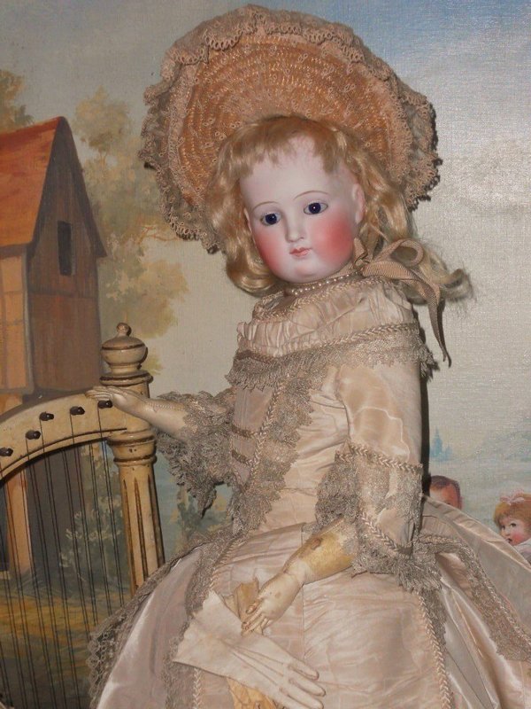 Superb early Elegant Grand French Bisque Poupee with Gorgeous Costume