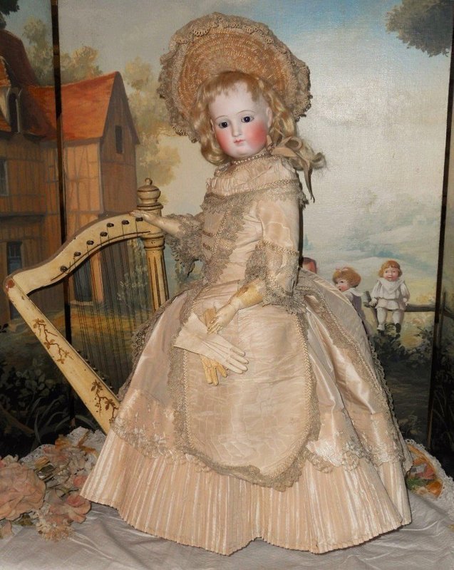Superb early Elegant Grand French Bisque Poupee with Gorgeous Costume