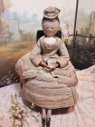 Outstanding Early Wooden Doll with Fantastic Silk Costume