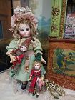 Lovely Bisque Jester Mignonette Boy & Girl in original Clothing