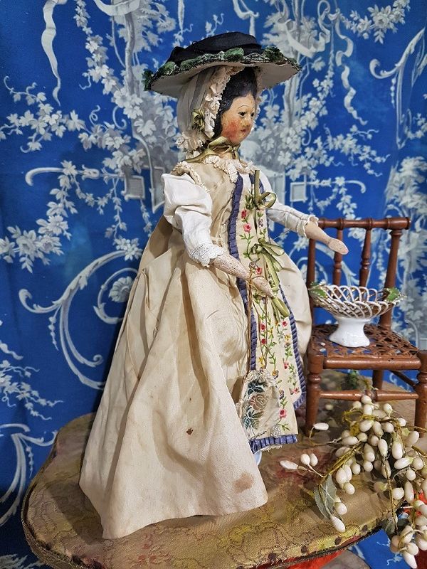 Outstanding Early Wooden Doll in Beautiful Silk Costume