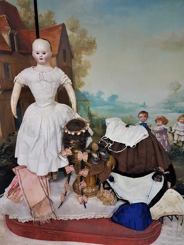 All original 1840-Era French Paper Mache Doll with gorgeous Costume