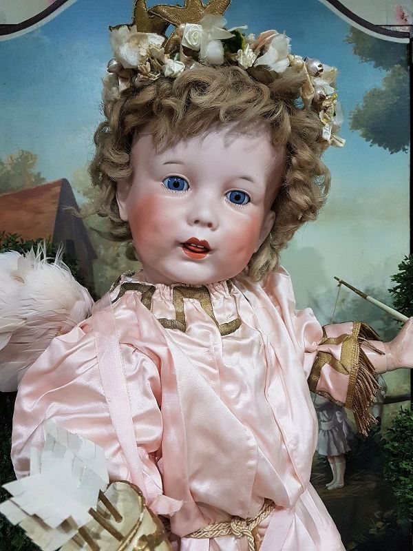 Cute large French Bisque Character by SFBJ in lovely antique Clothing