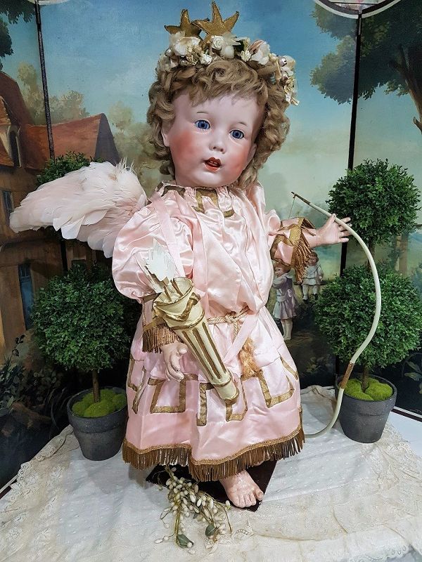 Cute large French Bisque Character by SFBJ in lovely antique Clothing