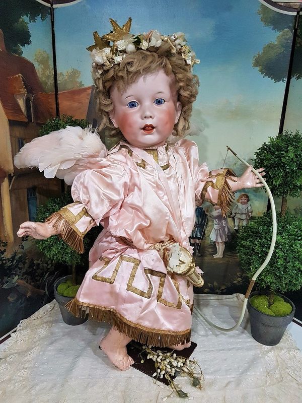 Cute large French Bisque Character by SFBJ in lovely antique Clothing