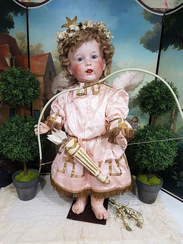 Cute large French Bisque Character by SFBJ in lovely antique Clothing