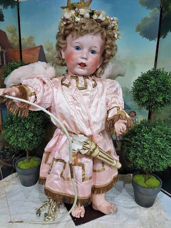 Cute large French Bisque Character by SFBJ in lovely antique Clothing