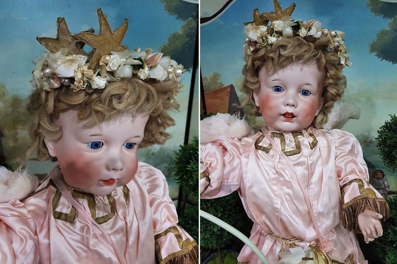 Cute large French Bisque Character by SFBJ in lovely antique Clothing
