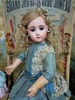Rarest size 9 Bebe Triste by Emile Jumeau in lovely silk Costume