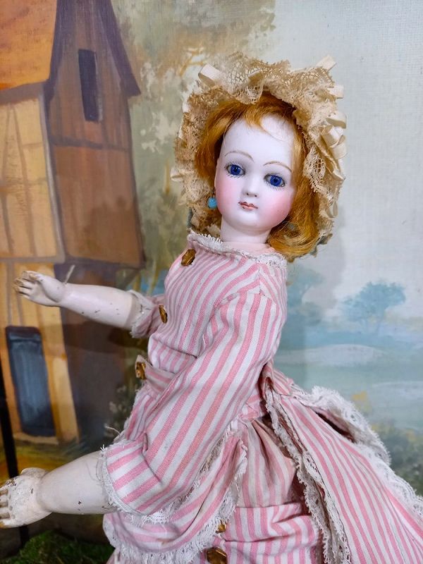 Rare French Teen Poupee with luxury leather covered Wooden Body