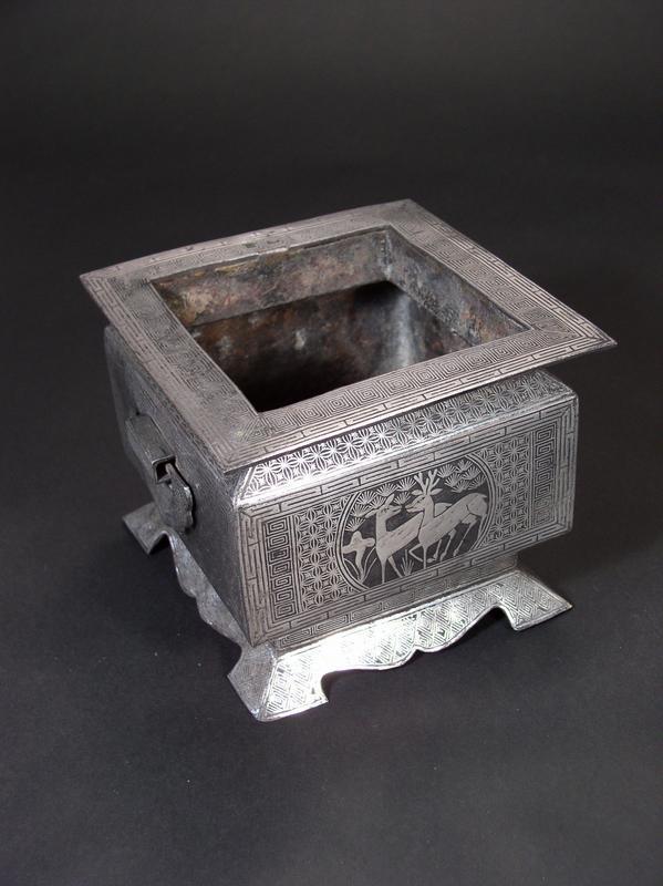 Korean silver-inlaid iron brazier with deer and cranes