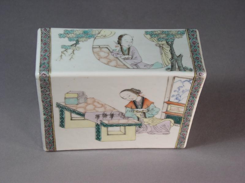 Chinese porcelain headrest with interior scenes
