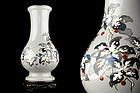 Japanese Cloisonne vase with Snow capped flower by Ando Jubei