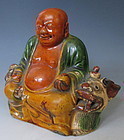 Chinese Antique Sancai Glaze Seated Budai on Kirin