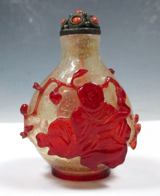 Peking Glass Snuff Bottle With Carvings Of A Man