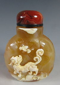 Chinese Agate Snuff Bottle with Old Man and Fu-dog