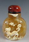 Chinese Agate Snuff Bottle with Old Man and Fu-dog