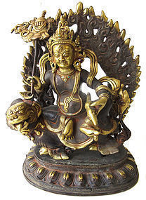 Tibetan Gilt Bronze Statue of Kubera on Beast