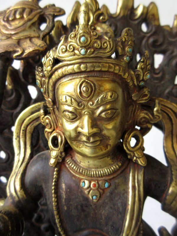 Tibetan Gilt Bronze Statue of Kubera on Beast