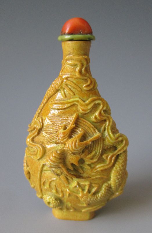 Chinese Antique Molded Porcelain Yellow Snuff Bottle with Dragon