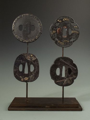 Four Antique Japanese Tsuba with Stand