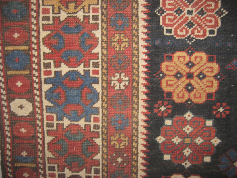 Antique Oriental Kazak Rug